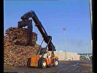 work of loaders in a timber warehouse